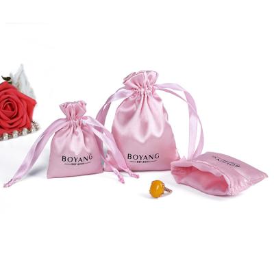 China Wholesale Custom Recyclable Pink Silk Logo Small Luxury Drawstring Pouch Satin Hair Extension Packaging Bag for sale