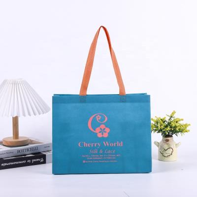 China Wholesale Handled Non Woven Tote Bags Cheap Non Woven Shopping Bags With Logo Custom for sale