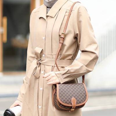 China Raincoat Made in China High Quality Presbyopic Women's Shoulder Messenger Bag PU Saddle Bag Simple Texture Most Competitive Price for sale