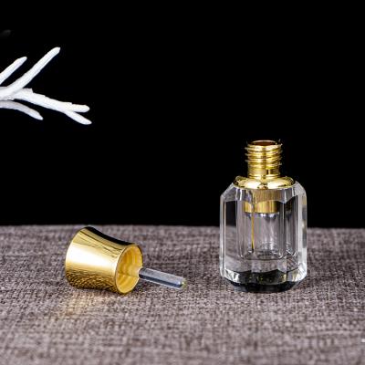 China Arabic Wholesale Fancy Desgin Transparent Crystal Bottle Perfume for sale