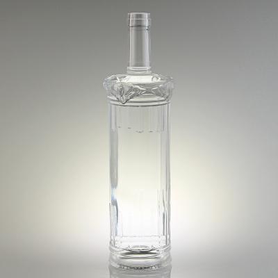 China GLASS Customized Embossed Vodka Bottle 750 Ml Mindless Bottles With Cork Stopper for sale