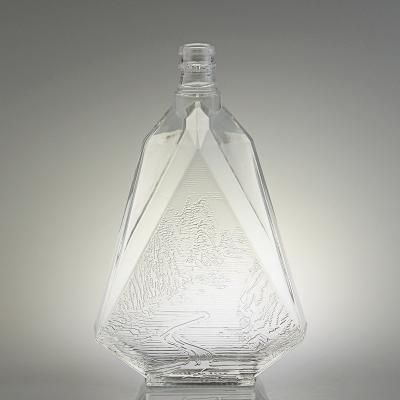 China Custom Embossed Logo Vodka Bottle Unique Shaped Vodka Spirits Glass Bottle For Whiskey for sale