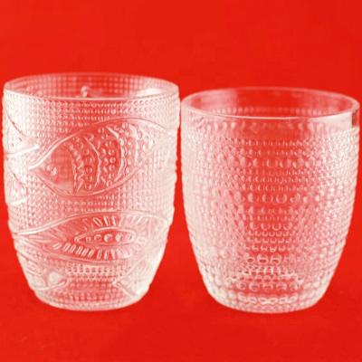 China Food Food Grade Embossed Round Shape Reusable Glass Water Cup for sale