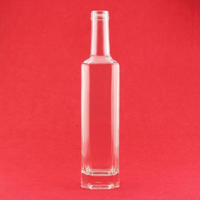 China 500ml High Grade Brandy Glass Bottle Transparent Shoulder Flat Square Brandy Bottle With Screw Lower Cap for sale