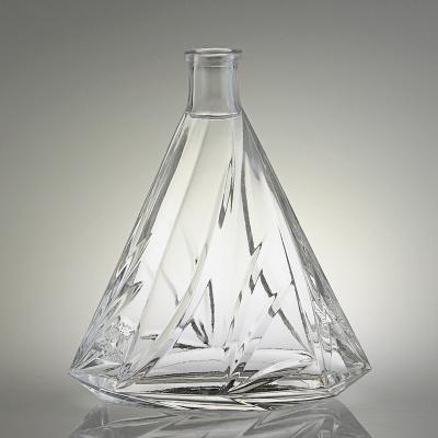 China Brandy 500ml 750ml Yuncheng Made Flint Bottle Transparent Triangle Embossed Super Brandy Glass Bottle With Cork for sale