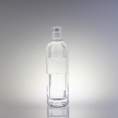 China Hot Selling Vodka Ribbed Shaped Glass Vodka Bottle 750ml Empty Spirits Bottles With Synthetic Cork for sale