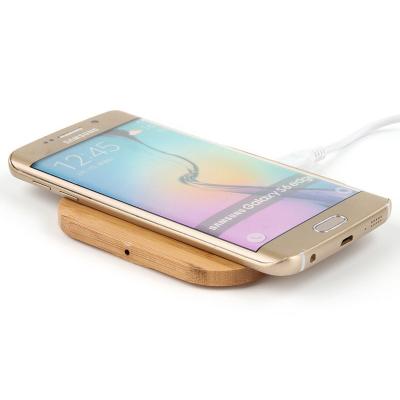 China Portable Wireless Charging Station Wooden Bamboo Wireless Charger Mobile Phone Qi Qi Charger For Phones for sale