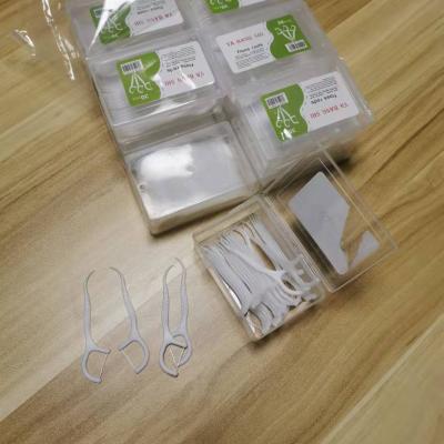 China Tooth Care Dental Floss Pick Wholesale White Plastic Box Packaging Biodegradable Tooth Care Stick Pick Dental Floss for sale