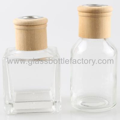 China Clear Aroma Diffuser Glass Bottle With Wood Cork for sale