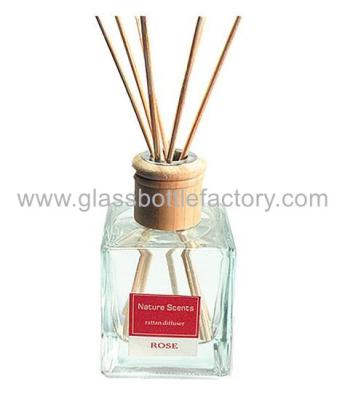 China 150ml Clear Aroma Diffuser Glass Bottle With Wood Cork And Rattan for sale