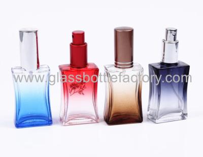 China 50ml Colored Hot Selling Perfume Glass Bottles With Screw Sprayer and Cap for sale