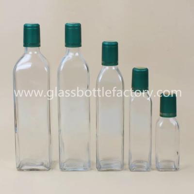 China 100ml,250ml,500ml,750ml,1000ml Clear Square Olive Oil Glass Bottles With Green Caps for sale