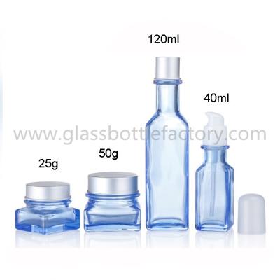 China 2017 New Model Blue Color Painting 40ml,120ml Glass Lotion Bottles And 25g,50g Glass Cosmetic Jars For Skincare for sale