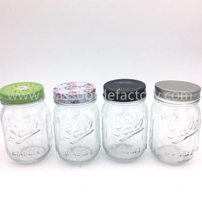 China 16oz Clear Glass Mason Jars With Lids for sale