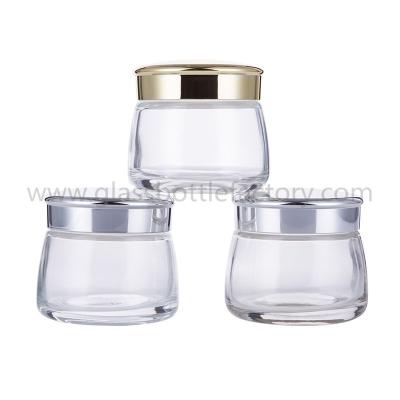 China 130g Clear New Model Glass Cosmetic Jar With Silver or Gold Lid for sale