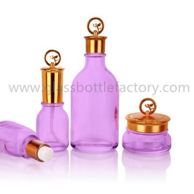 China New Model 145ml,45ml,30ml Glass Lotion Bottles and 45g Glass Cosmetic Jar With Gold Cap for sale