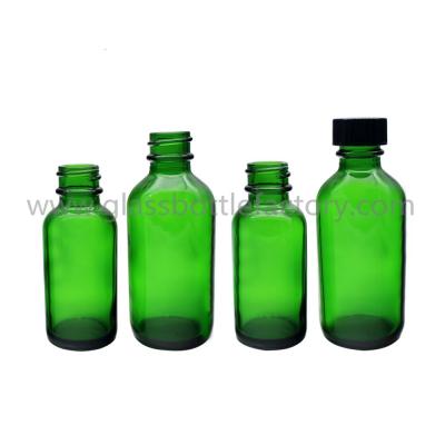 China 1oz and 2oz Green Boston Round Glass Bottles With Black Caps for sale