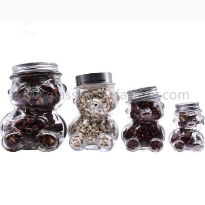 China 50ml,80ml,150ml,300ml Clear Bear Style Glass Honey Jars With Lids for sale