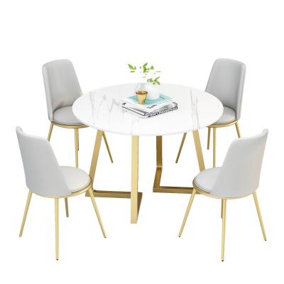 China (Others) Adjustable unique luxury white marble dining table gold stainless steel round modern tables for sale