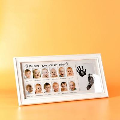 China European\Modern\Middle East\Africa Customized Home Natural Wood Frame Decoration Baby Hand and Foot Print Photo Frame for sale