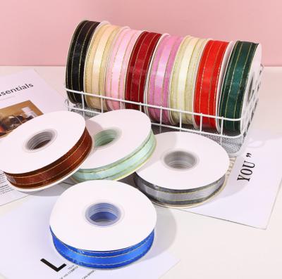 China Viable Present Gift Wrapping Metallic Ribbon Gold Christmas Glitter Bag Edge Technics Style Time Advance Tissue Wrapping Pattern Face Tape for sale