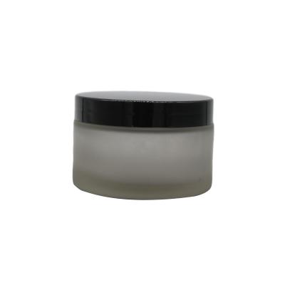 China Personal Care Products 15g 30g 50g 100ml Matte Black Cosmetic Glass Cream Jar 1oz Glass Jar For Skin Care for sale