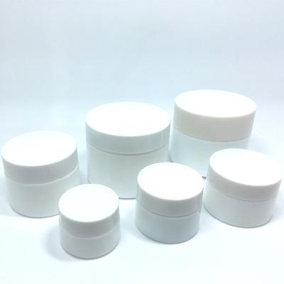 China Personal care products empty glass jar 30g 30ml opal white glass cream jar ceramic cosmetic packaging for sale