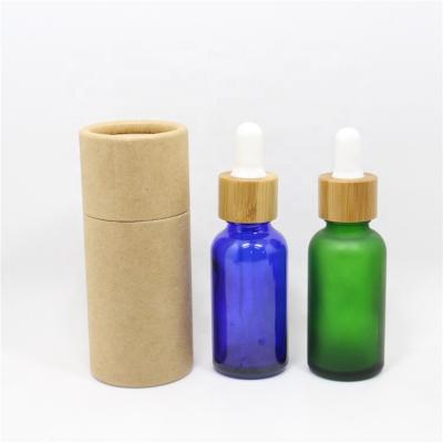 China Personal Care 15ml 20ml 30ml Frosted Clear Glass Dropper Bottle With Bamboo Lid Cap Essential Oil Glass Bottle Frosted Green for sale