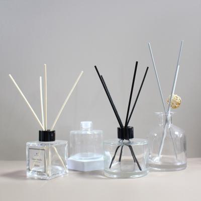 China Amber Glass Tubular Aroma Diffuser Bottle 250ml 200ml 150ml 100ml Tummy Cosmetic Home Shape With Cork Top for sale