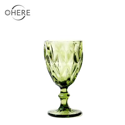 China Sustainable Colored Glazed Glass Texture Red Wine Champagne Glasses Wedding Cup Glass for sale