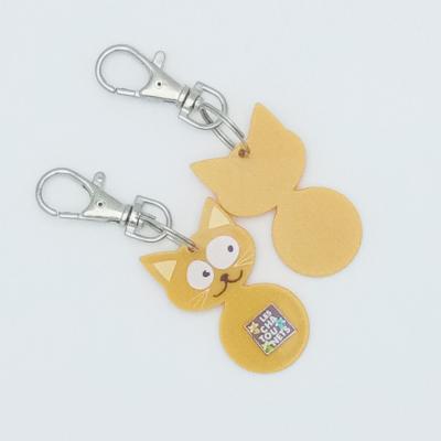 China Trolley Animal Coin Shaped China Cat Key Chain for sale