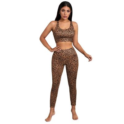 China Anti-pilling new design women fashionable yoga set tight hip halter sports running fitness leggings two-piece set wholesale for sale