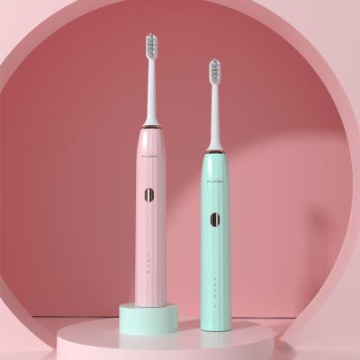 China Wholesale Mini Foldable Rechargeable Ultrasonic Automatic Vibrating Pink Toothbrush for sale