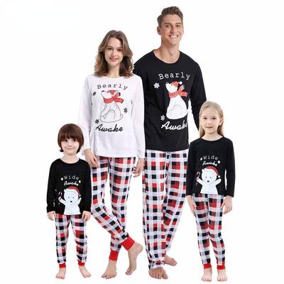 China Breathable Letter Graphic and Cartoon Bear Print Pajamas Tee and Plaid Pants Tight Fit Christmas Family Matching Pajamas for sale