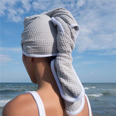 China Compressed Custom Microfiber Hair Turban Towel Super Absorbent Quick Drying Soft And Comfortable Hair Dryer Towel for sale