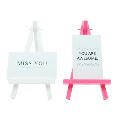 China Eco-friendly material desktop art easel hotsale Amazon plastic mini easel stand for sale