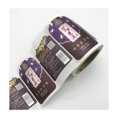 China Waterproof custom self-adhesive wine label gold foil bottle sticker roll up logo sticker embossed label for sale