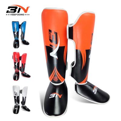 China PU B&B Shin Guards Muttahida Majlis-e-Amal Leg Leather Instep Pads Protective Muay Thai Boxing Training for sale