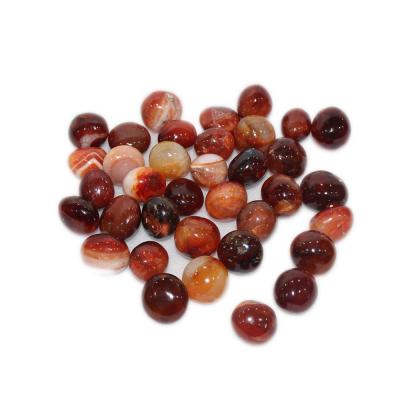 China Natural Red Palm Stone Quartz Massage China Agate Tumble Stone Crystal Healing Stones for sale