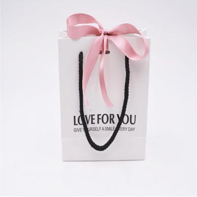 China China Manufacturer Custom Recyclable Paper Bag Packaging Clothing Shopping Bag For Wicks Cosmetics for sale