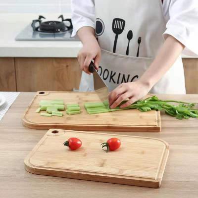 China Sublimation 100 Sustainable Eco Friendly Empty Bamboo Wood Laser Engraved Juice Orchard 8x6 Cutting Board With 4 for sale