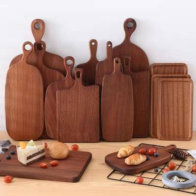 China Kitchen Sublimation Resin End Viable Empty Grain Dark Walnut Acacia Ebony Wood Wooden Cutting Board With Handle for sale