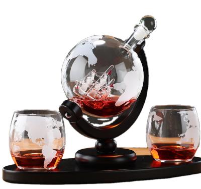 China Hot Selling Cheap Globe Whiskey Globe Decanter With Wooden Low Handmade Liquor Glass Decanter With 4 Cups for sale