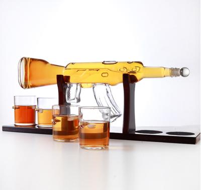 China CREATIVE Home Bar Decor Liquor Dispenser With Base Ak 47 Gun Whiskey Decanter Glass And Wood Gift Set for sale