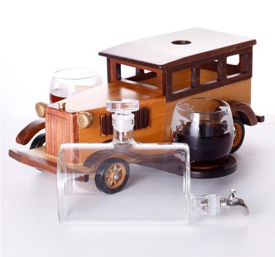 China Manufacturer Supply Unique Single Glass Liquor Bottle CREATIVE Decanter with Wooden Base Car Whiskey Glass Decanter for sale