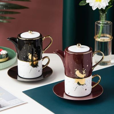 China Viable Creative Ceramic Teapots and Kettles Porcelain Personal Coffee Mug Set Ceramic Cup Teapot for sale