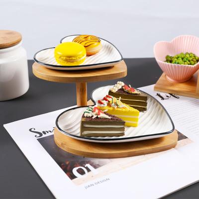 China Sustainable Restaurant Home Dinner Dishes Ceramic Plates Snack Dishes Dishes Sets Heart Shape Ceramic Dish With Bamboo Tray for sale