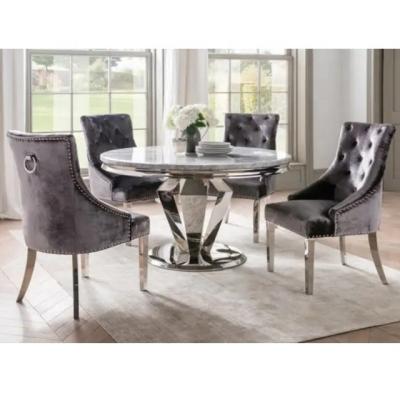 China Modern 1.3M Circular Stainless Steel Dining Table with Gray Marble Top with 4 Gray Crushed Velvet Knocker Back Dining Chairs for sale