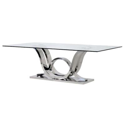 China Modern dining table with a glass table top and a stainless steel base for sale