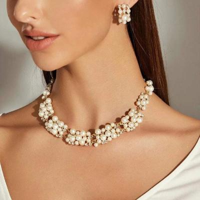 China Hot sale FASHIONABLE hot party women accessories fashion imitation pearl necklace clavicle chain and earrings suite temperament ornament for sale